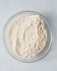 almond flour added over the banana egg mixture.