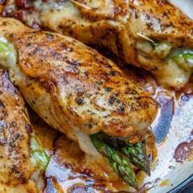 stuffed chicken breast on a skillet.