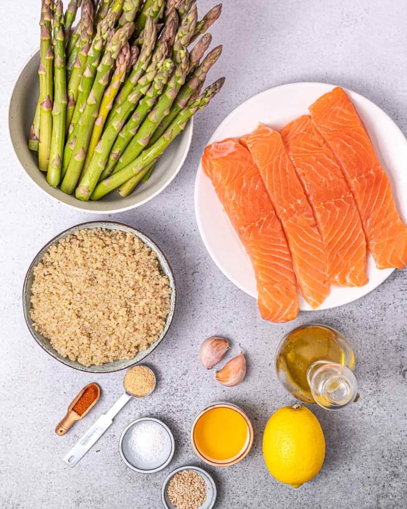 Ingredients for making honey salmon bowls divided into small portions.