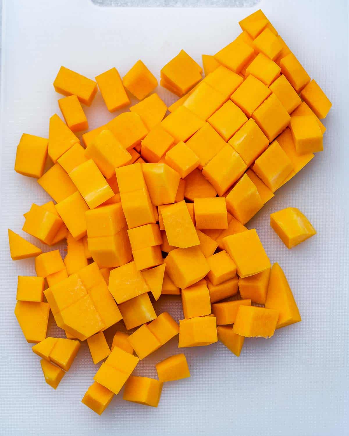 chopped butternut squash on a cutting board