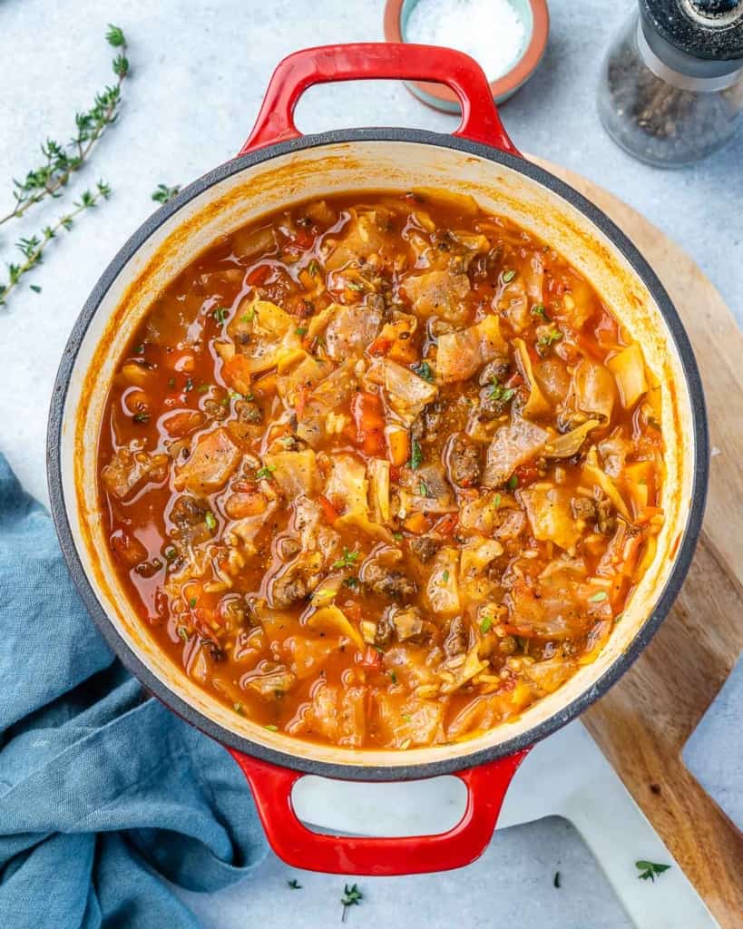 top view cabbage roll soup in a red pot