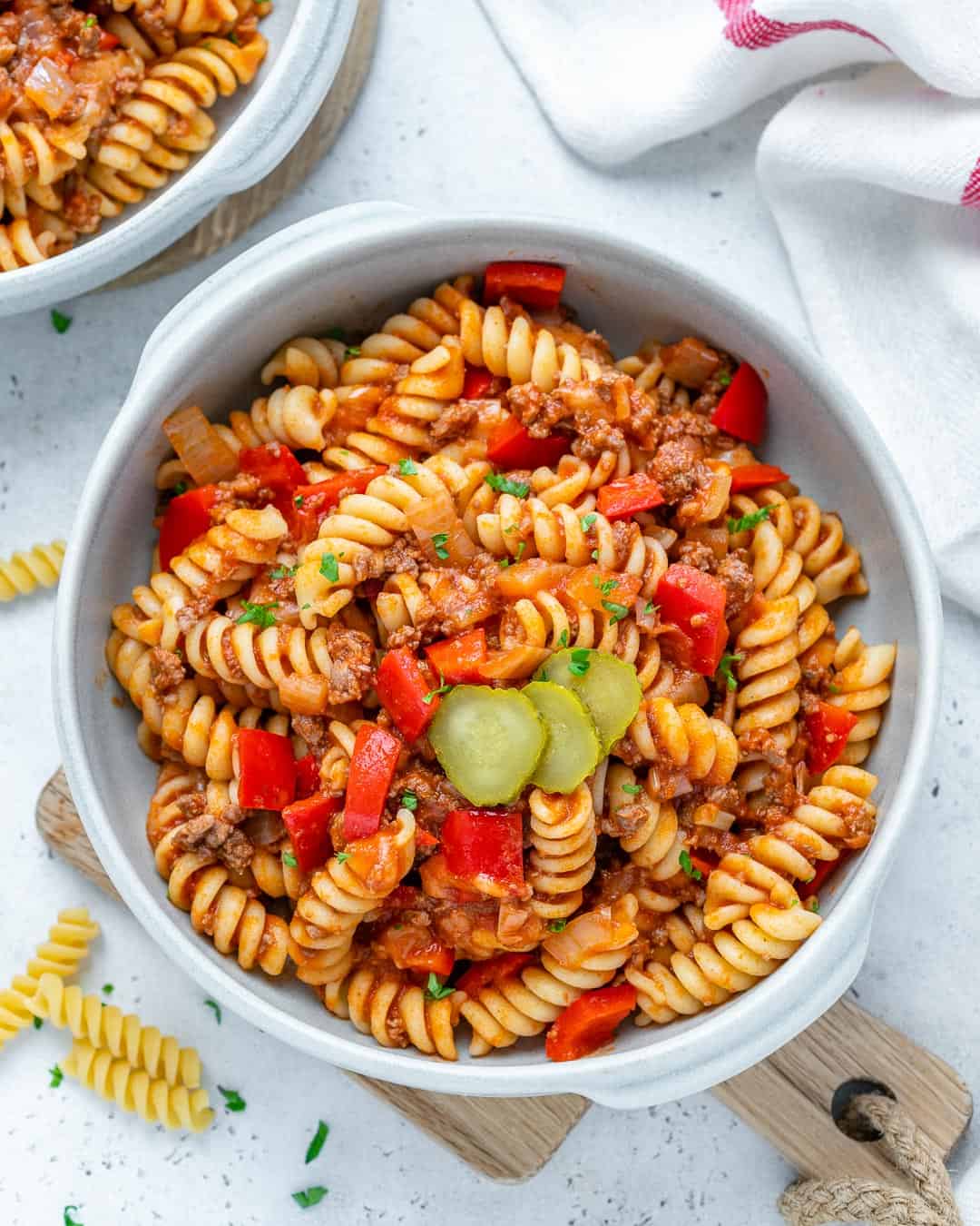 top view of beef pasta in a white bowl