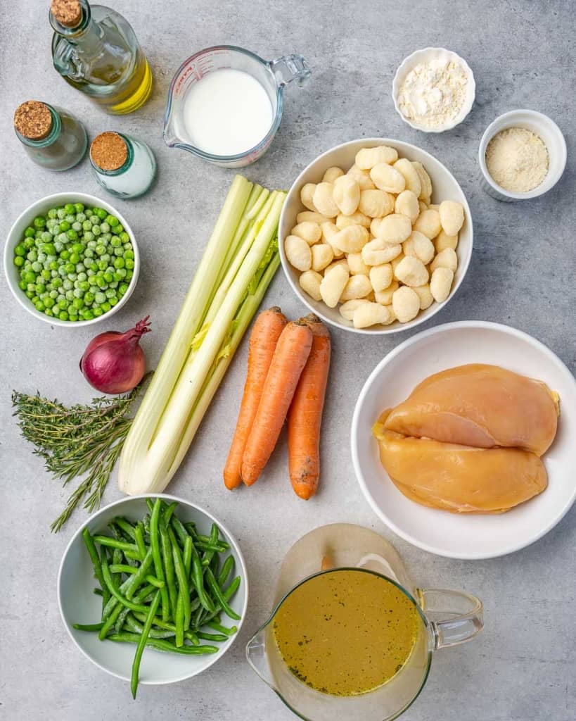 Overhead image of ingredients to make chicken gnocchi soup.
