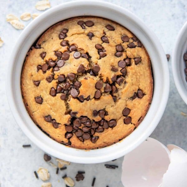 top view of bakes oats in a white mug