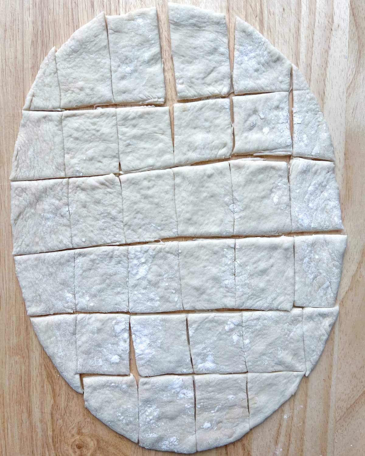 dough cut into 30 sections to make balls.