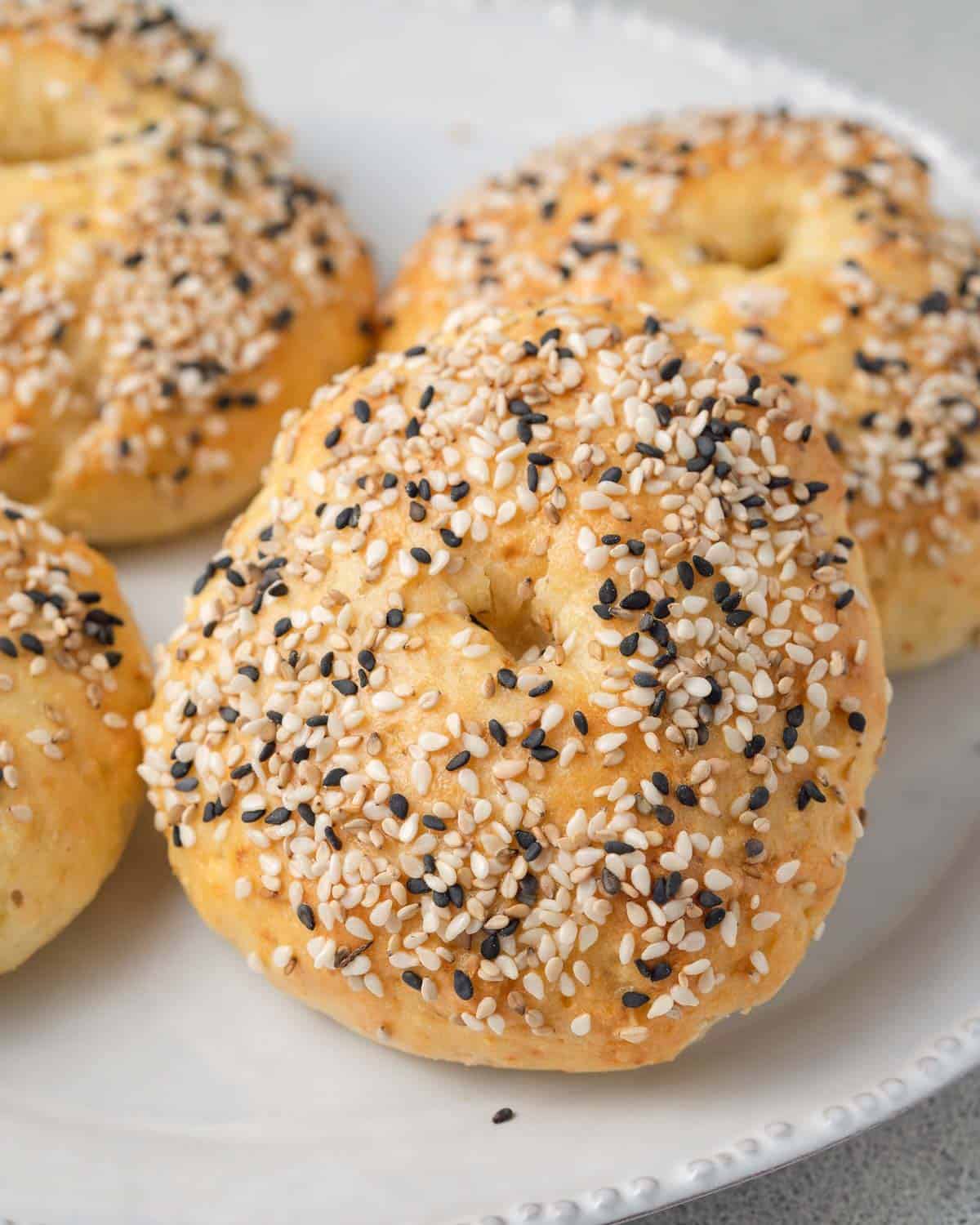 baked bagels on a plate.