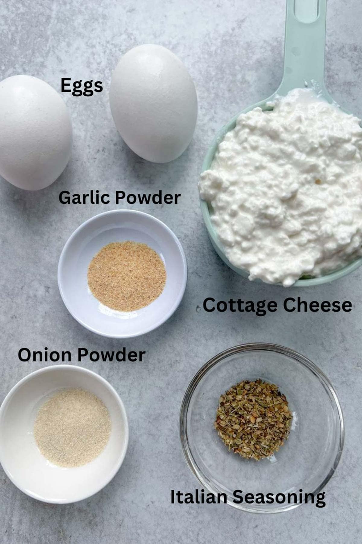 ingredients to make cottage cheese wrap, eggs, onion powder, garlic powder, Italian seasoning, and cottage cheese.
