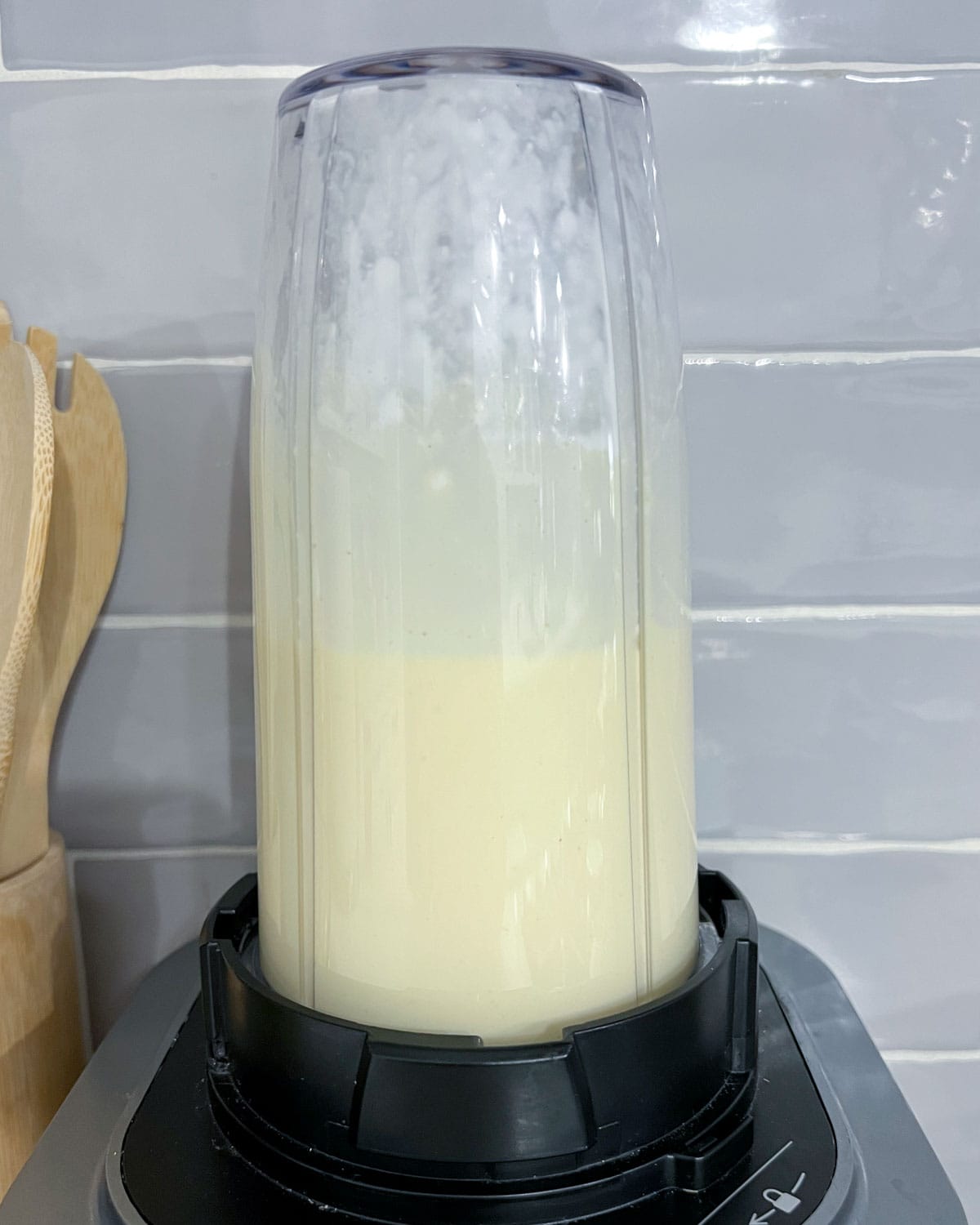 cottage cheese and eggs blended in a blender cup.
