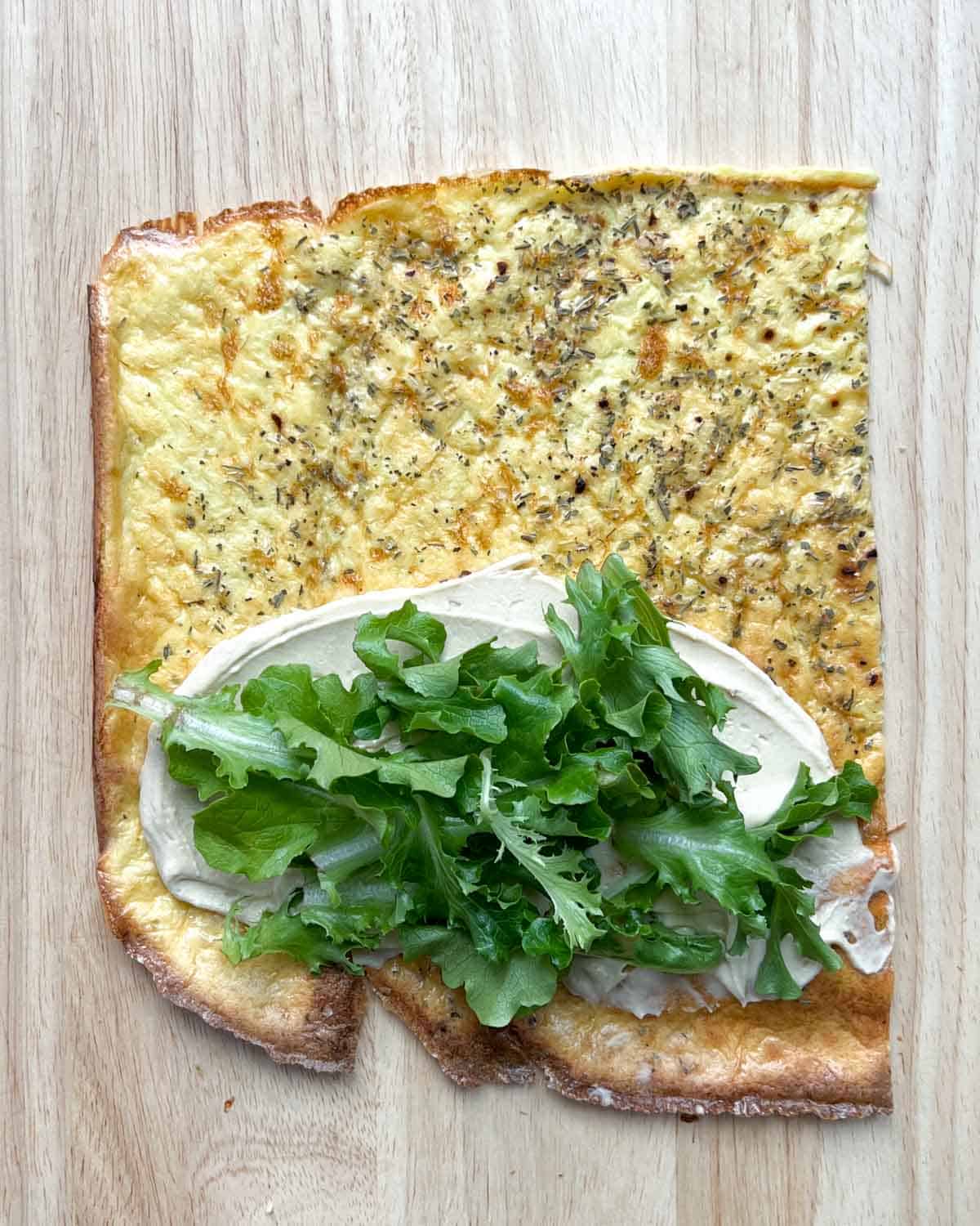 Greek Yogurt and Arugula added over half a wrap.