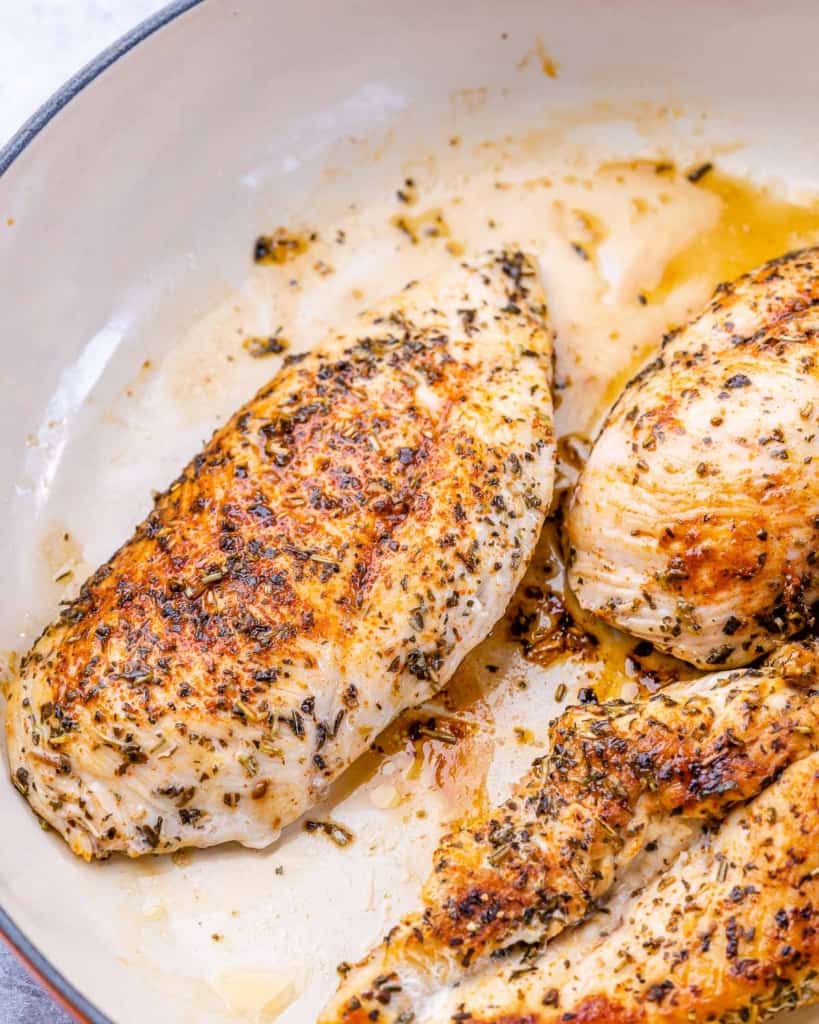 cooked chicken breast in a pan