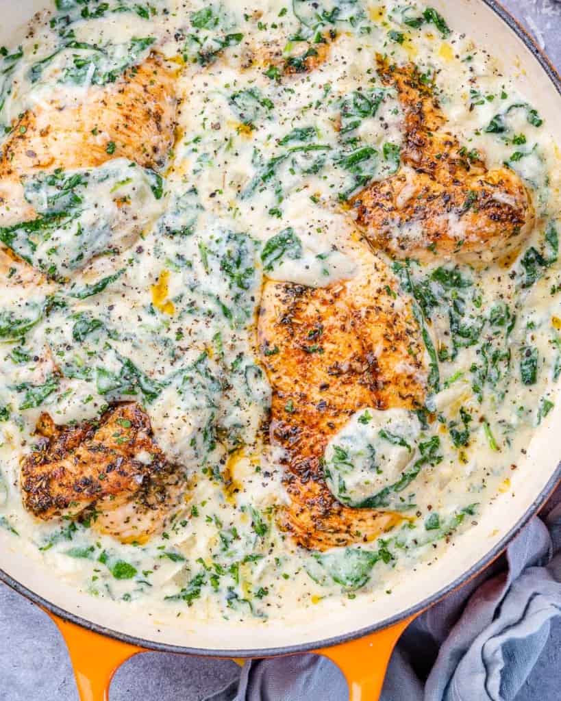 top view chicken breast in a creamy spinach sauce 