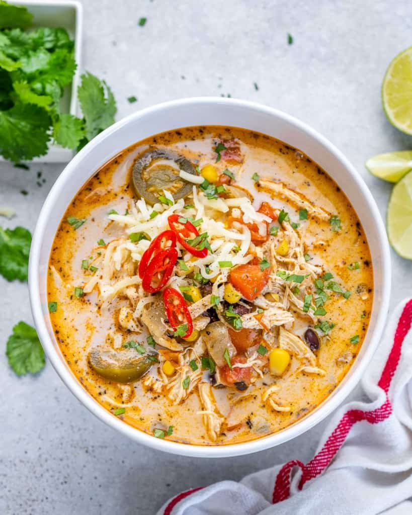 top view image of white bowl  with tortilla soup