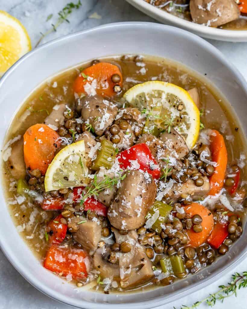 top view of a bowl with lentil and mushroom soup 