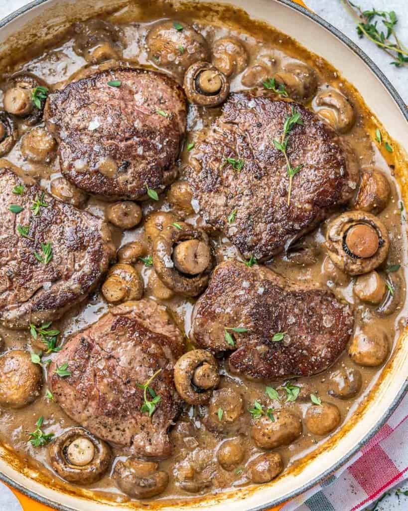 top view steaks in mushroom sauce 