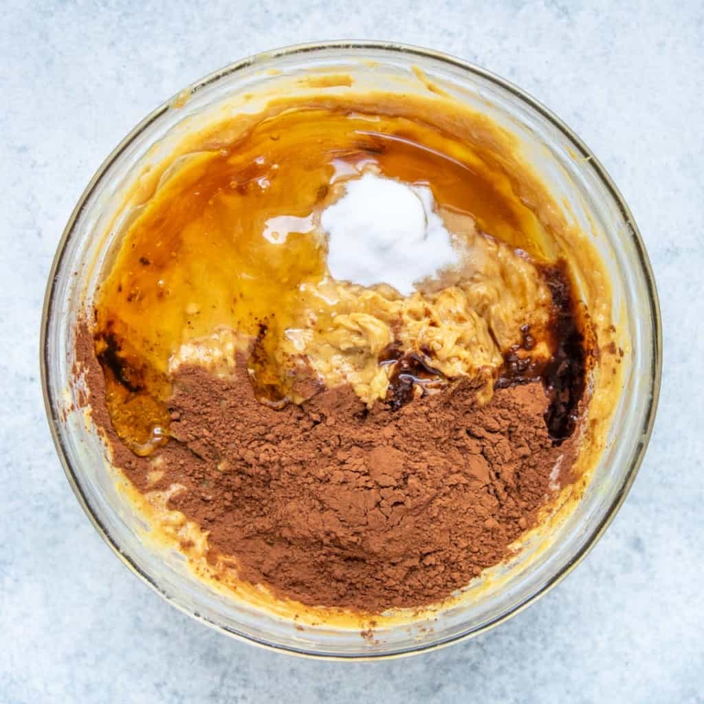 cocoa powder, honey, and baking soda added to batter 