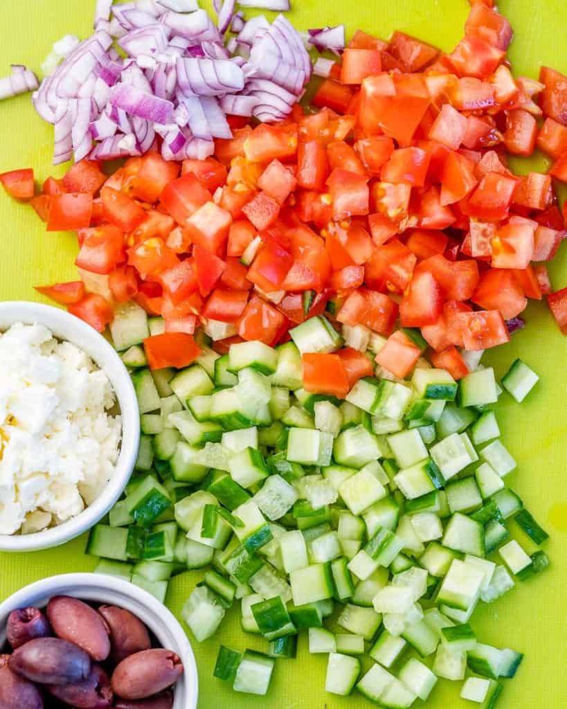 Top view of diced veggies on cutting board