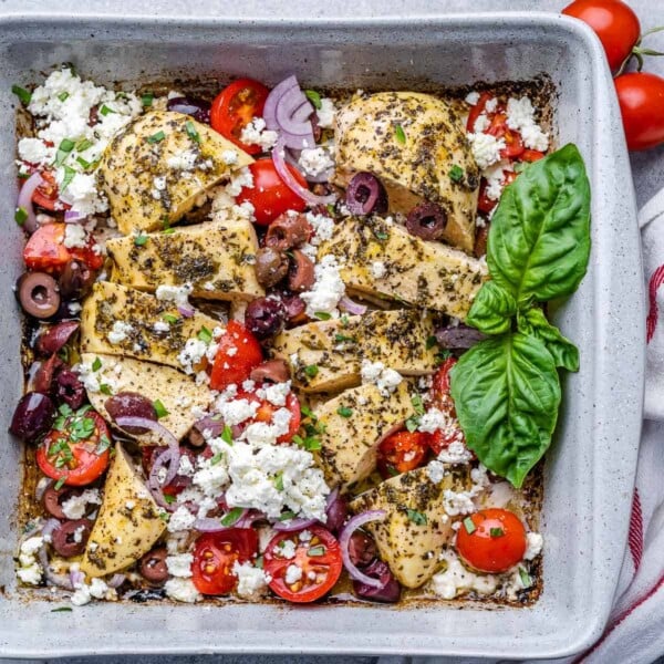 baked chicken breast with feta cheese olives and tomatoes.