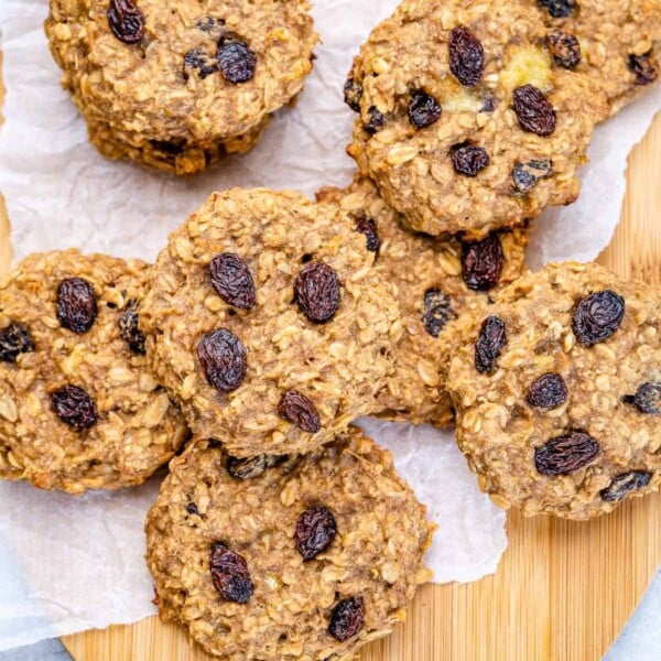 oatmeal raisin cookies on a cutting board.