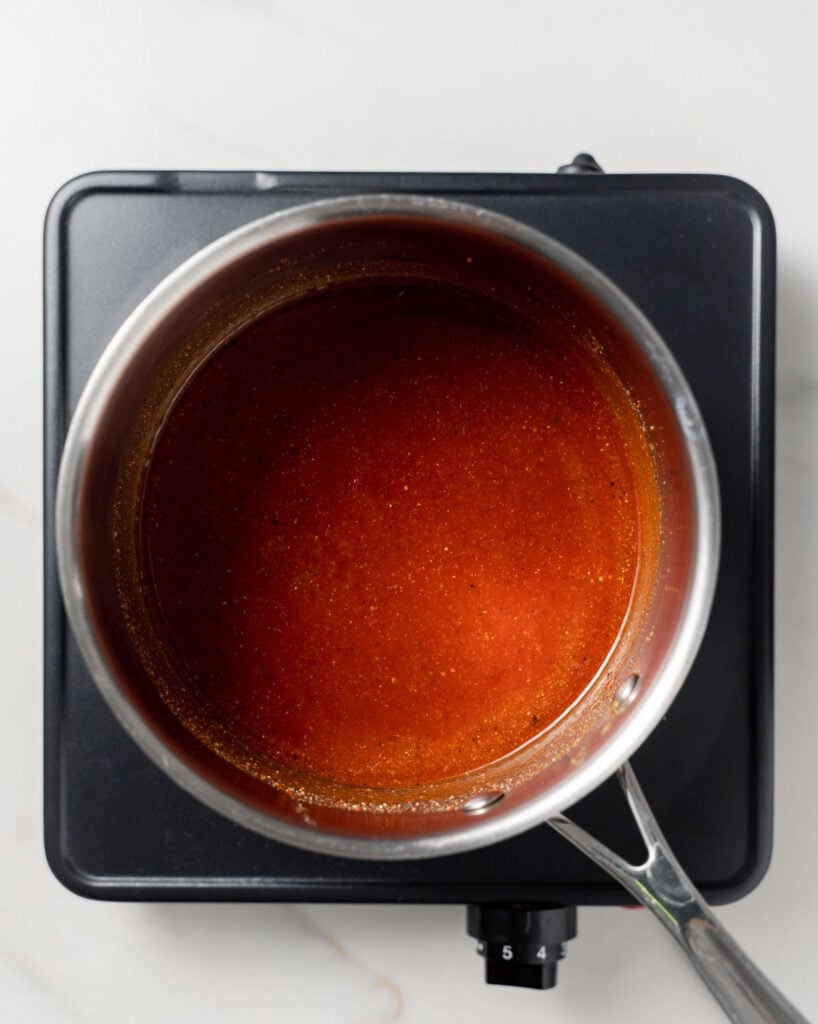 ingredients mixed in a pot to make bbq sauce