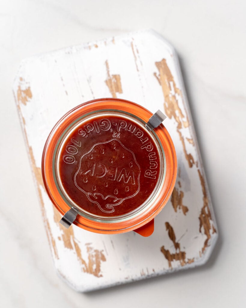 bbq sauce in a sealed jar to be stored 