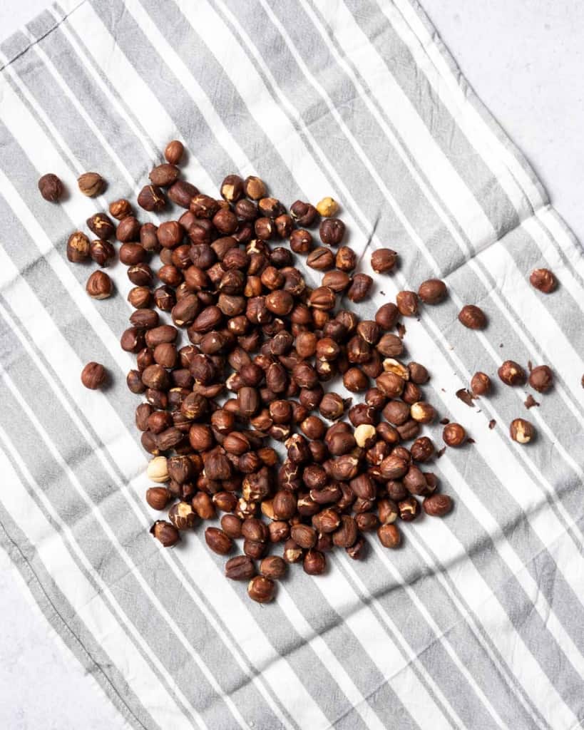 toasted hazelnuts on a towel