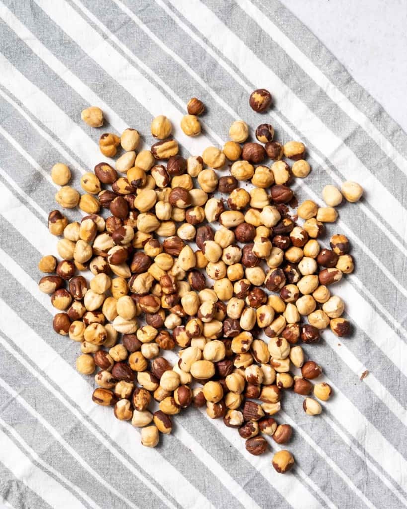 peeled hazelnuts on a towel
