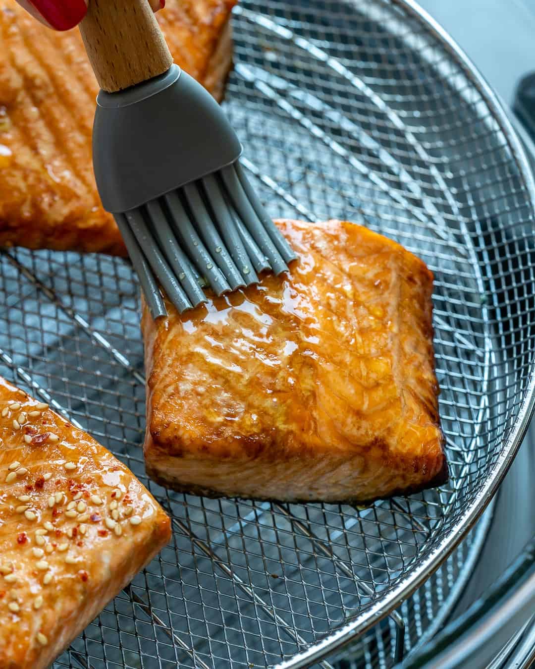 Brush salmon with honey.