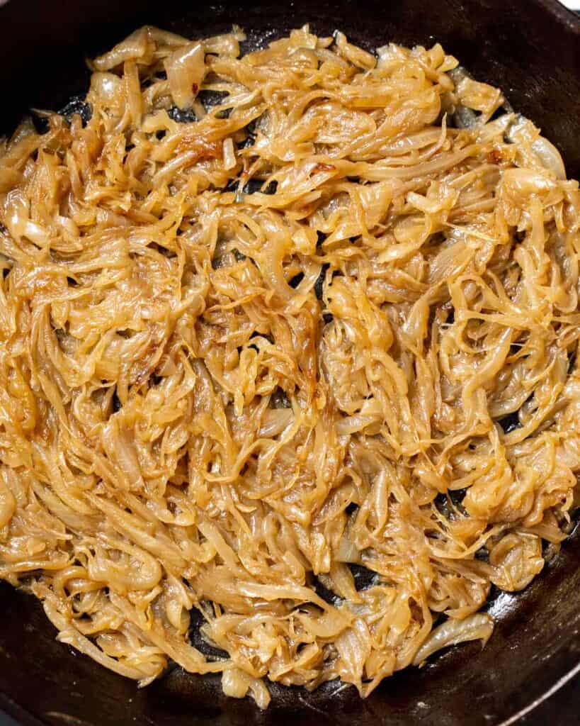 top view of a skillet with caramelized onions