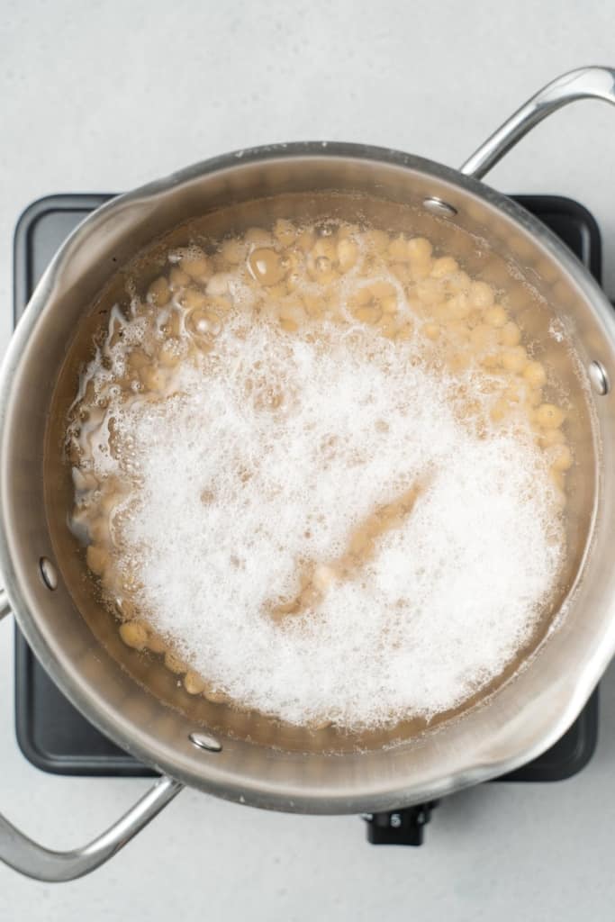 Bringing a pot of chickpeas to a boil.