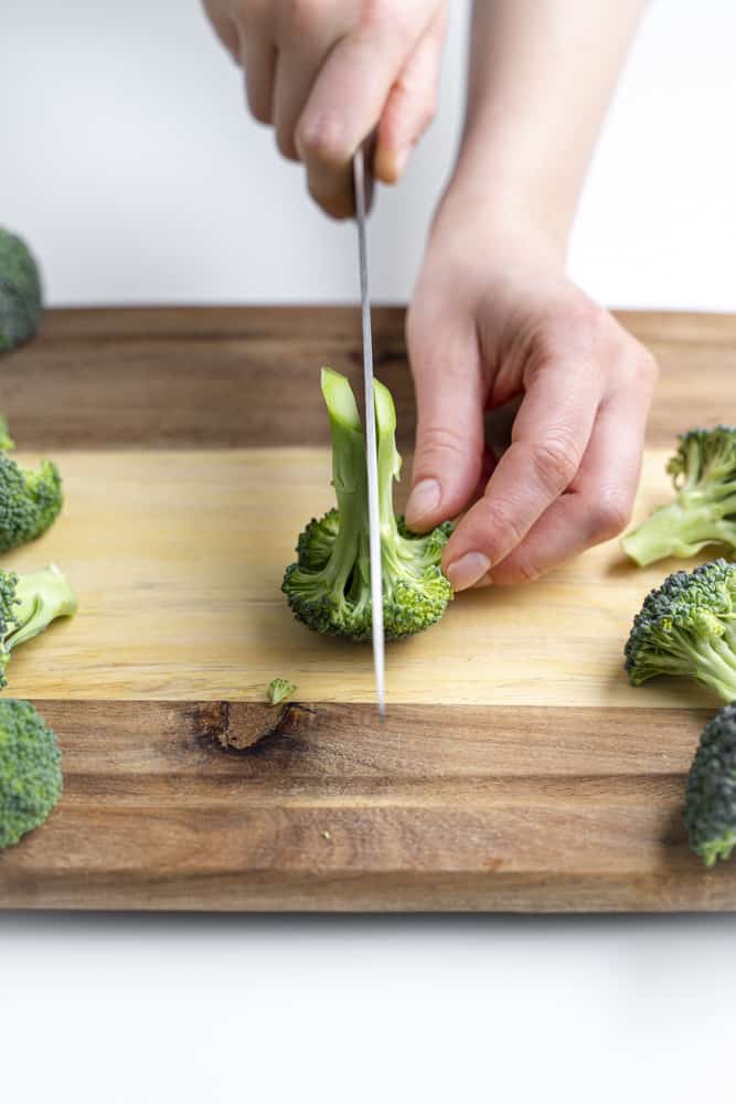 Slicing through a broccoli floret.