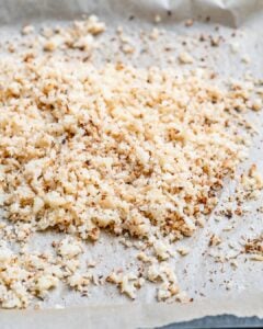 Spread the cauliflower "rice" on a baking sheet and bake until golden.