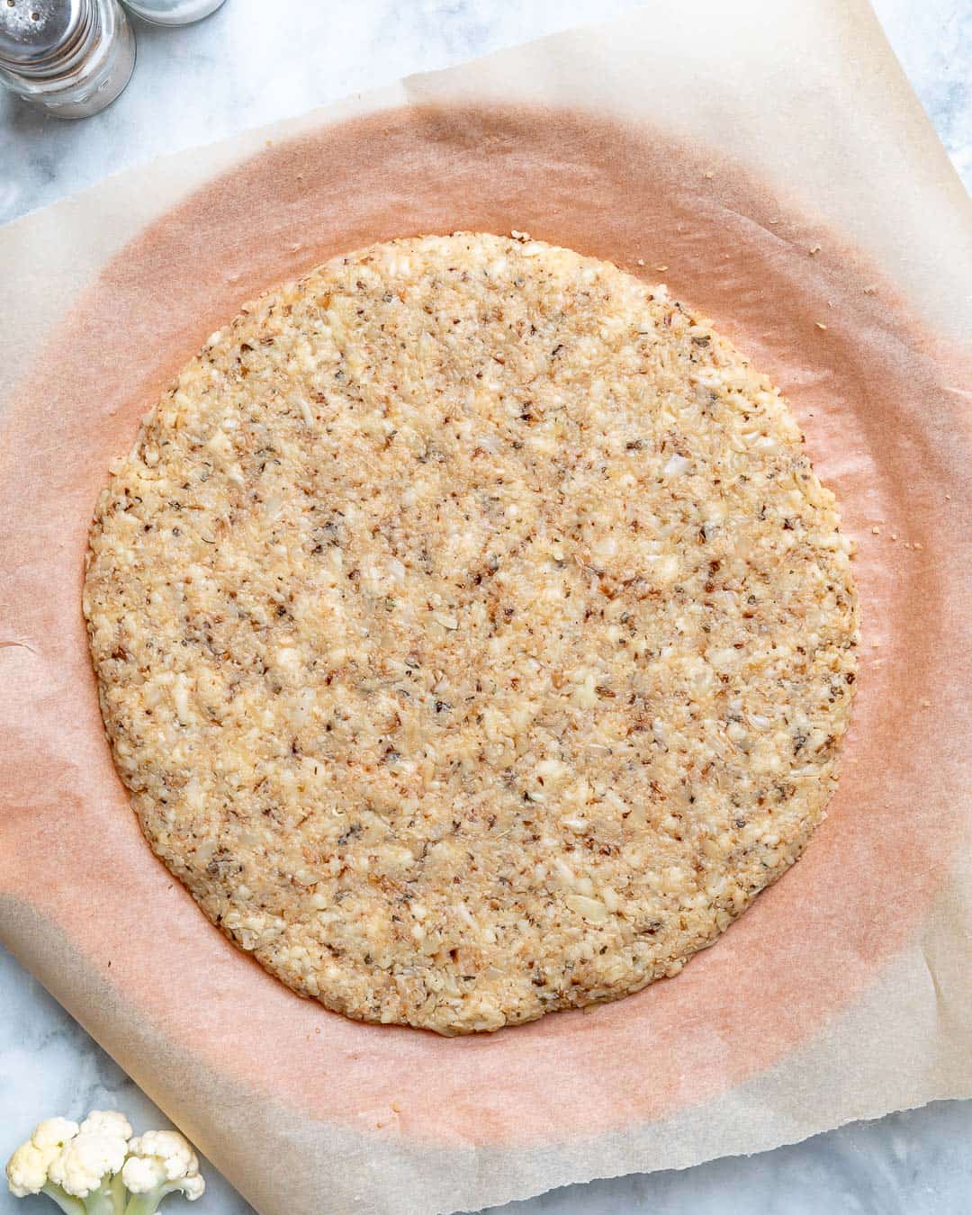 Place dough on baking sheet and pat into 13 inch circle.