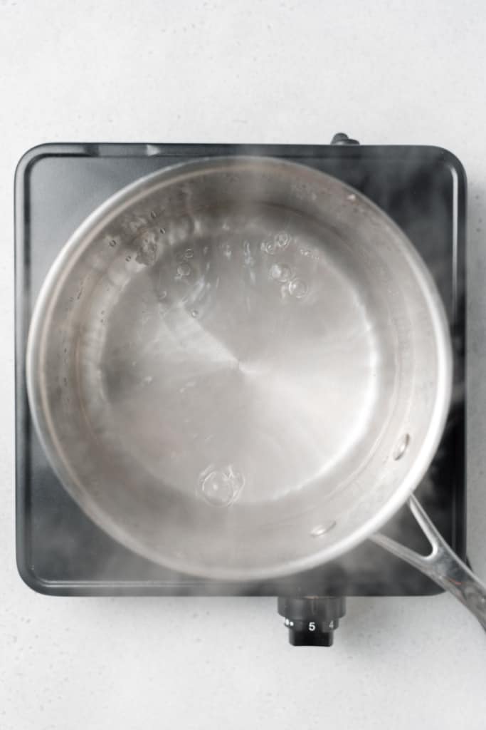 Water boiling in a pot.