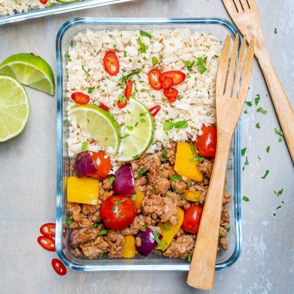 ground turkey and cauliflower rice skillet recipe in glass container.