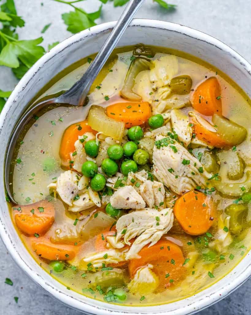 Soup made with turkey, carrots, peas and celery.