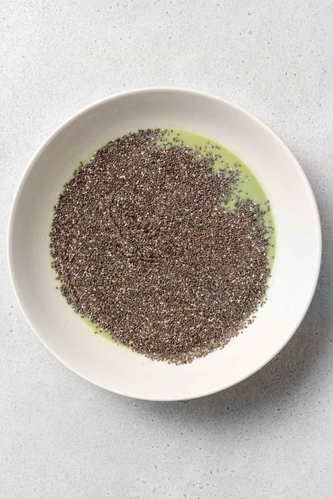 chia seed added over matcha milk