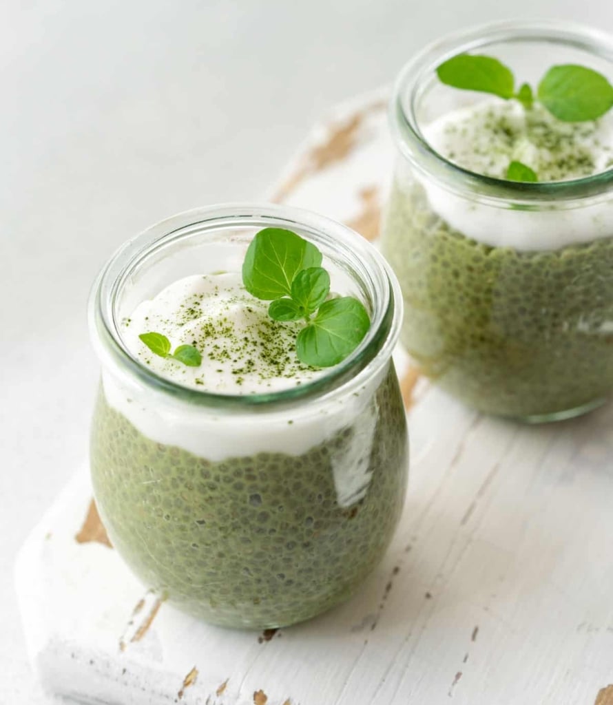 side shot chia pudding topped with yogurt and matcha powder