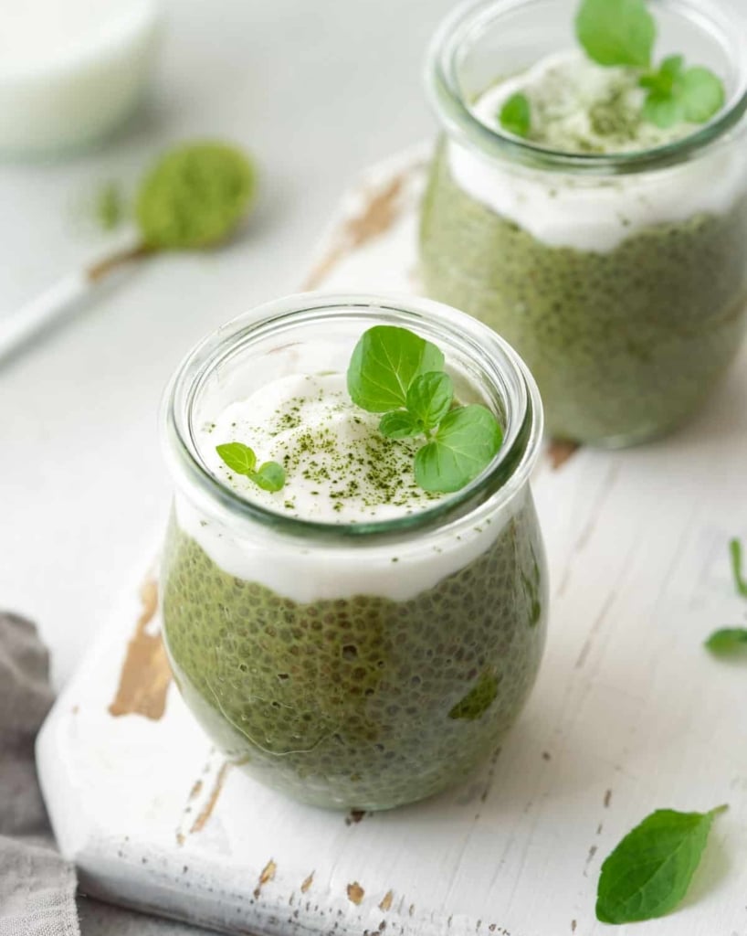 side shot of matcha chia pudding topped with yogurt