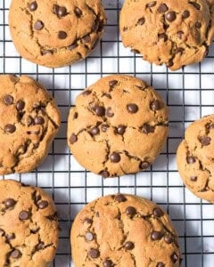 baked peanut butter with chocolate chip cookies on a wire rack cooling.