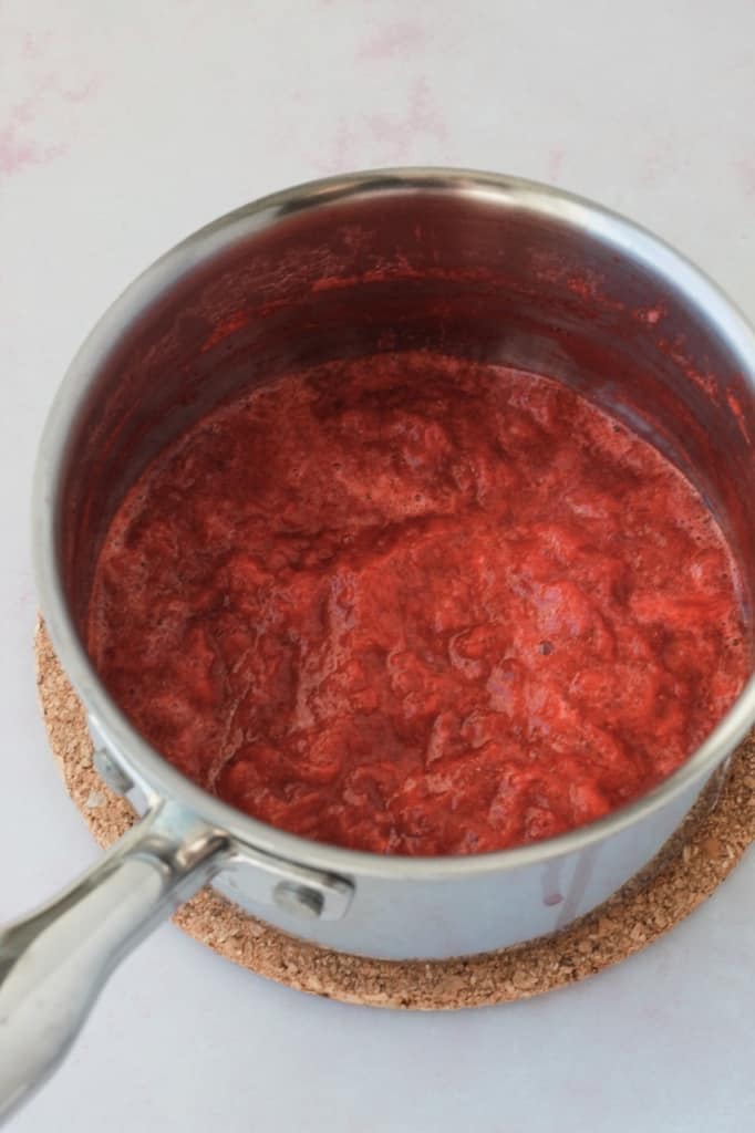 top view of a pan with mashed strawberries