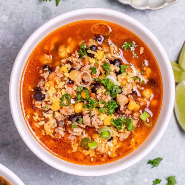 top view taco soup in a white bowl
