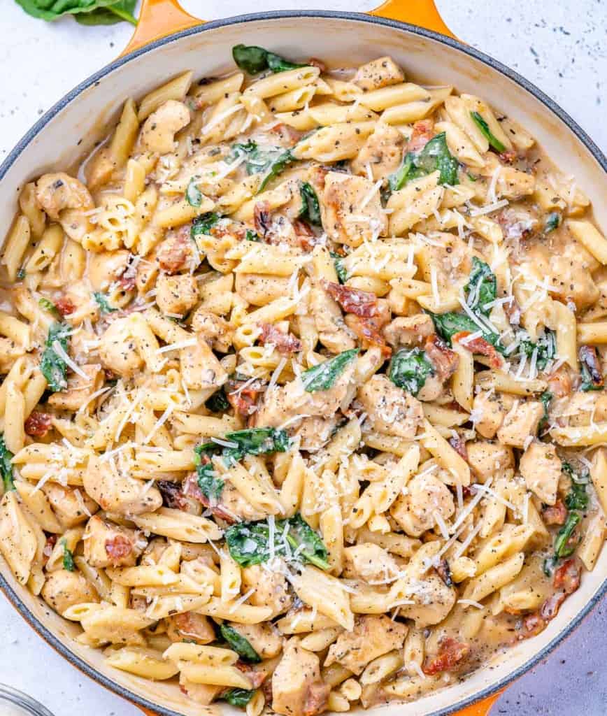 top view chicken pasta in a skillet