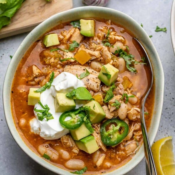 Bowl of turkey chili with spoon in it.