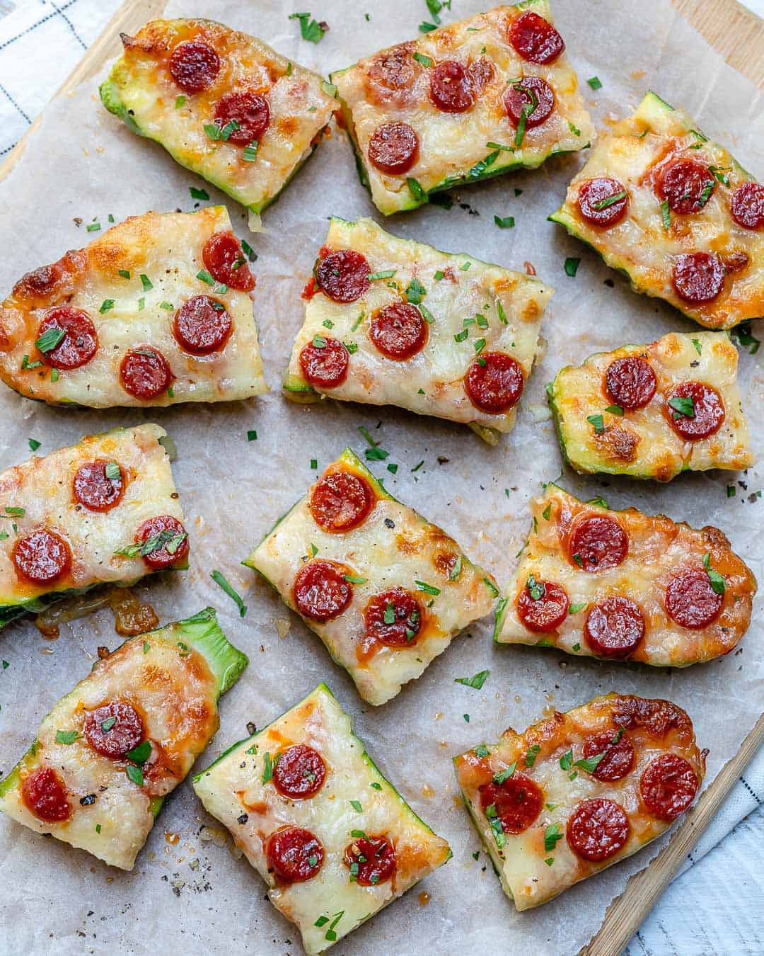 top view cut up zucchini pizza